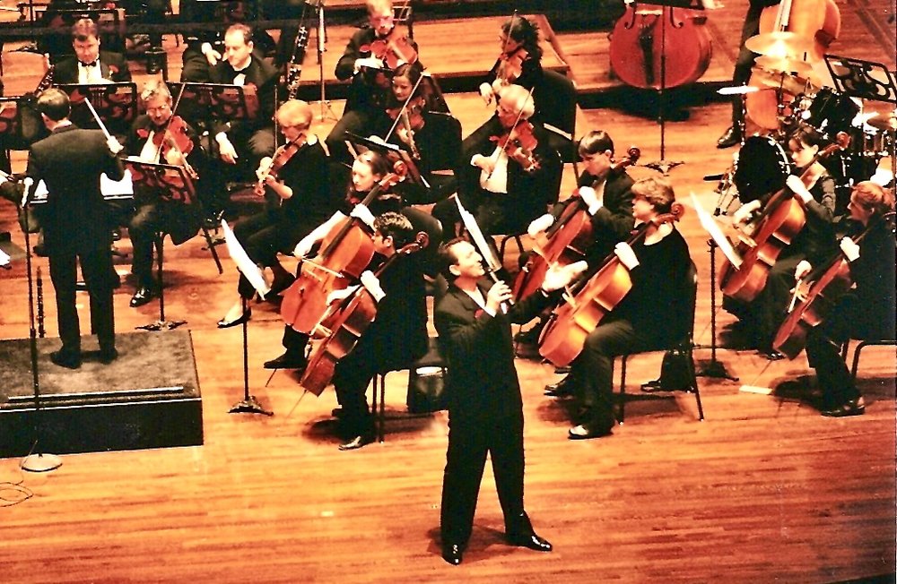 Billy Donato performing with orchestra